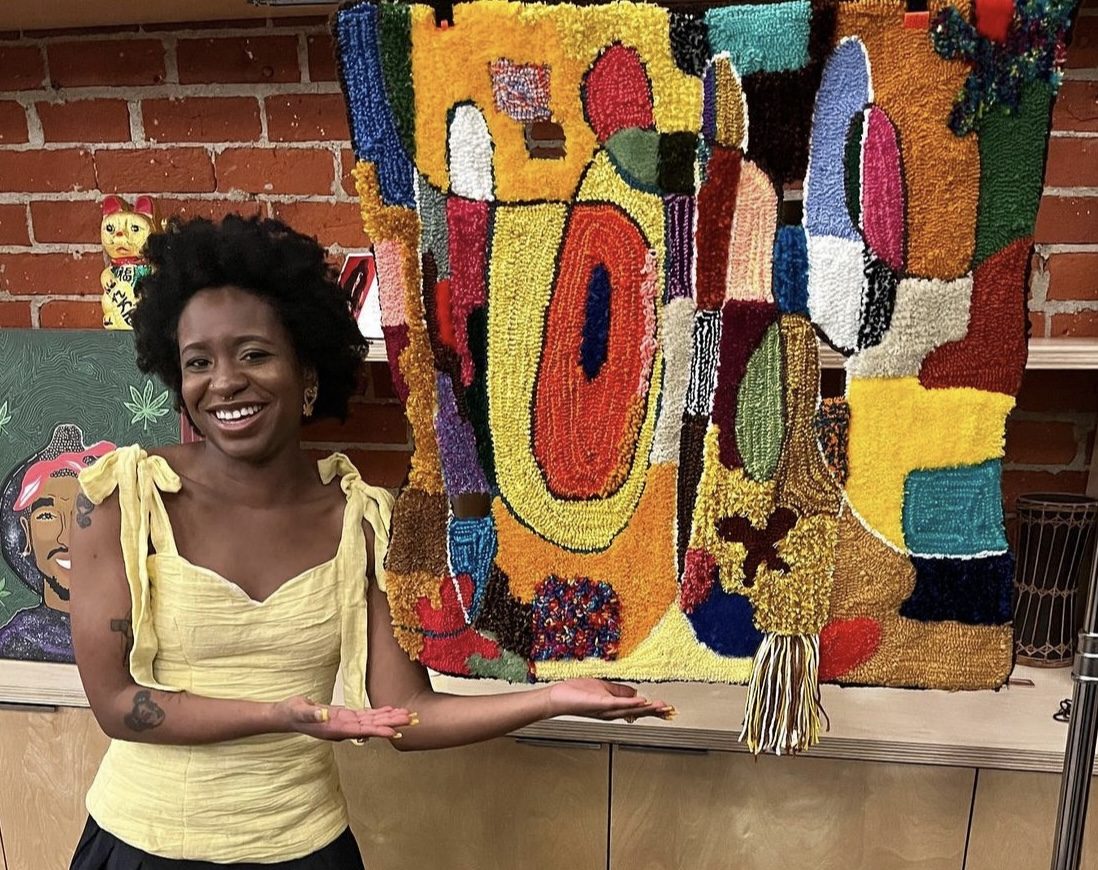 CTF artist presenting their artwork at exhibit